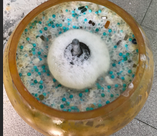 Turquoise round bead polishing